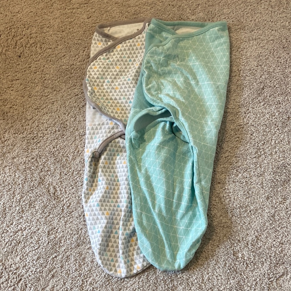 2 SwaddleMe swaddle sleep sacks. Size large. Excellent used condition.